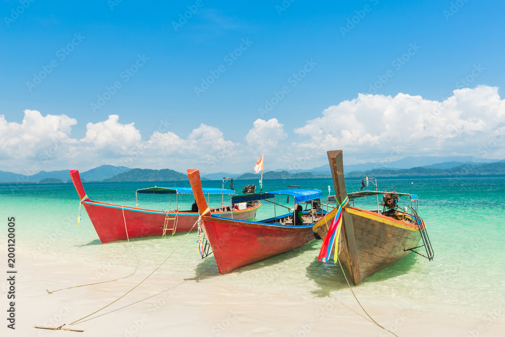 White sand beach and Long-tail boat at Khang Khao Island (Bat island), The beautiful sea Ranong Province, Thailand. White sand beach and Long-tail boat at Khang Khao Island (Bat island), The beautiful sea Ranong Province, Thailand.