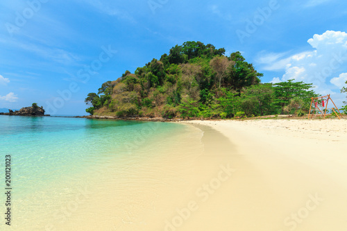 Bruer Island, amazing island from southern of Myanmar. A stunning seascape with turquoise water and white sand beach against blue sky at Bruer Island. Panoramic view © PRASERT