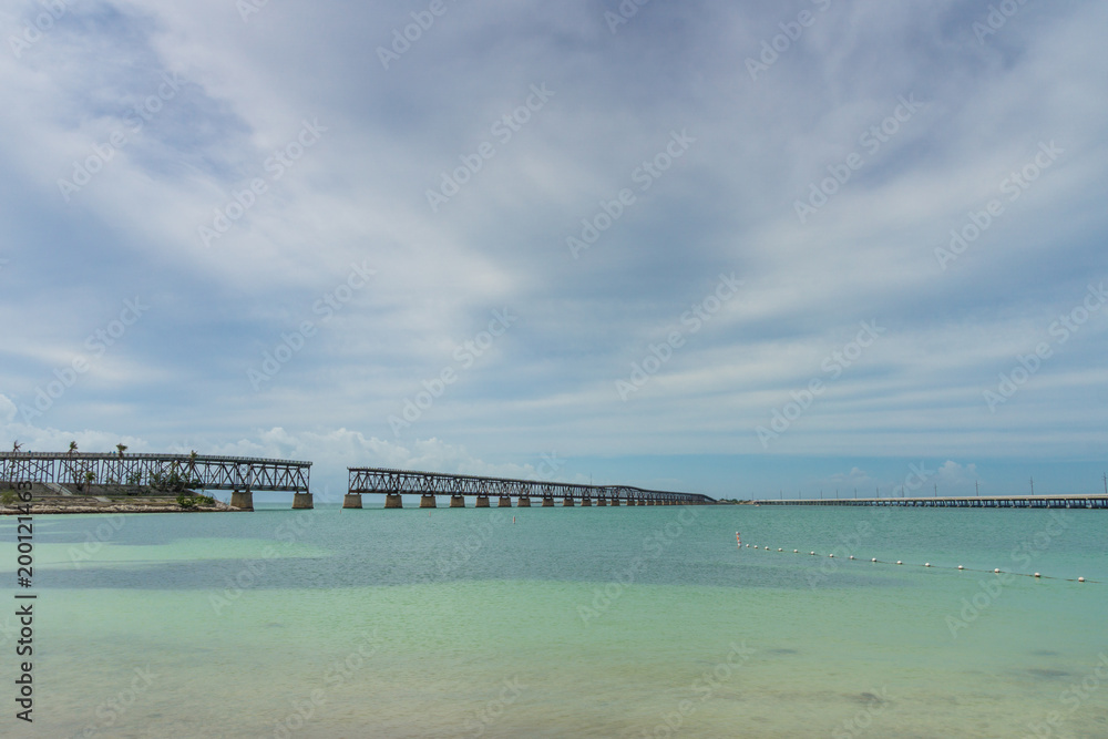 USA, Florida, Ancient overseas railway bridge in bahia honda state park from beach