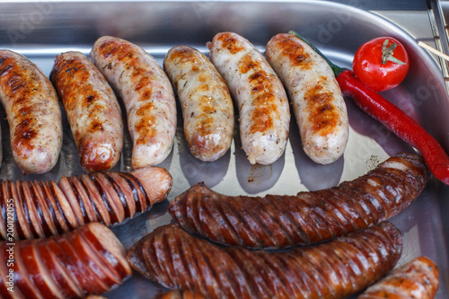 Delicious grilled sausages and Vegetable. Delicious food. photo