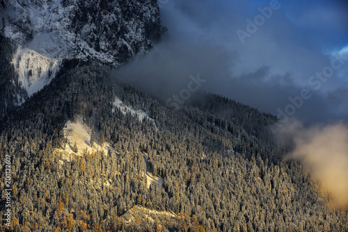 Amazing scene of Zugspitze mountain. Trees covered by snow. Bavarian peak near Garmisch Partenkirchen, Bavaria, Germany.