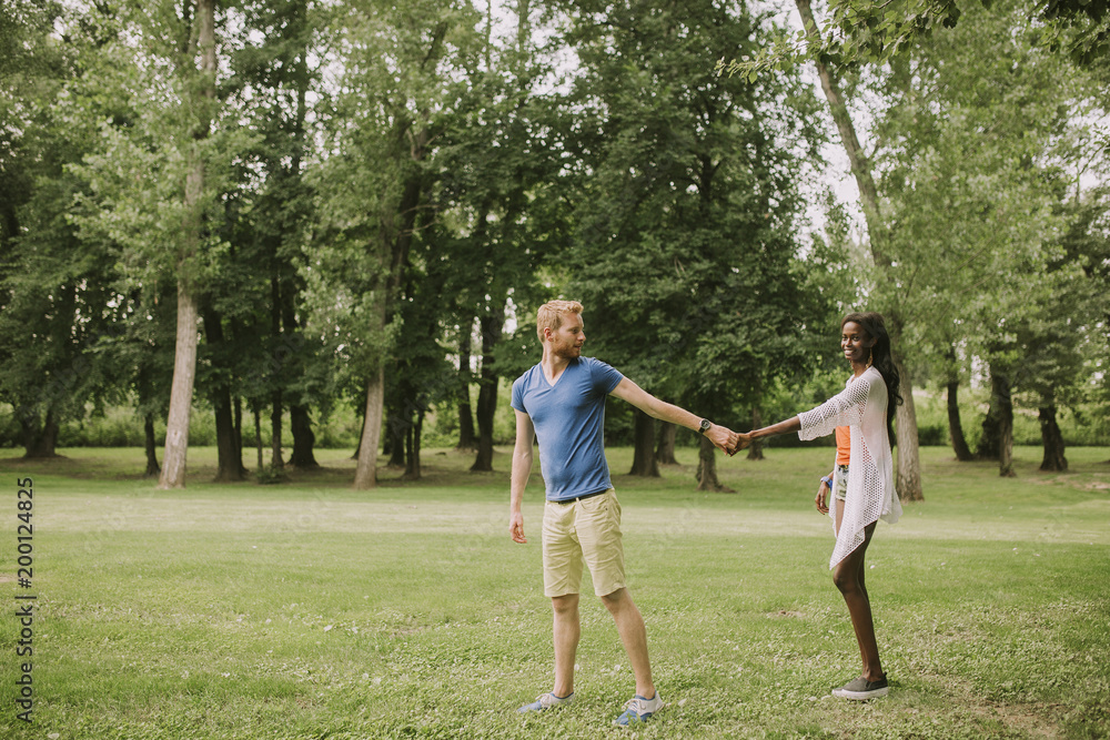 Multiracial couple in the park