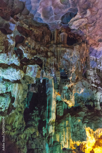 Inside Dong Thien Cung Cave that decorated with artificial green lights at Ha Long Bay. Quang Ninh, Vietnam.