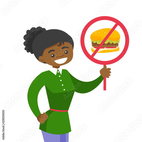 Young african-american woman holding placard with no fast food sign. Smiling woman protesting against fast food. Unhealthy nutrition concept. Vector cartoon illustration isolated on white background.