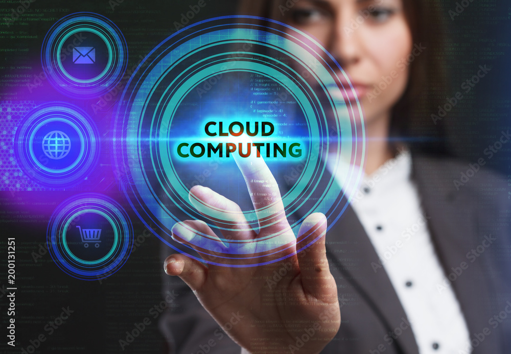 The concept of business, technology, the Internet and the network. A young entrepreneur working on a virtual screen of the future and sees the inscription: Cloud computing The concept of business, technology, the Internet and the network. A young entrepreneur working on a virtual screen of the future and sees the inscription: Cloud computing
