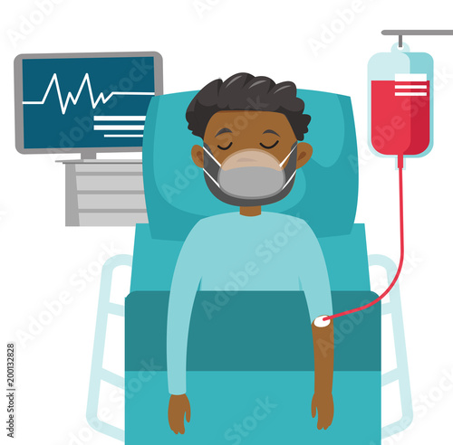 African-american man in coma lying in bed with a heart rate monitor in the hospital