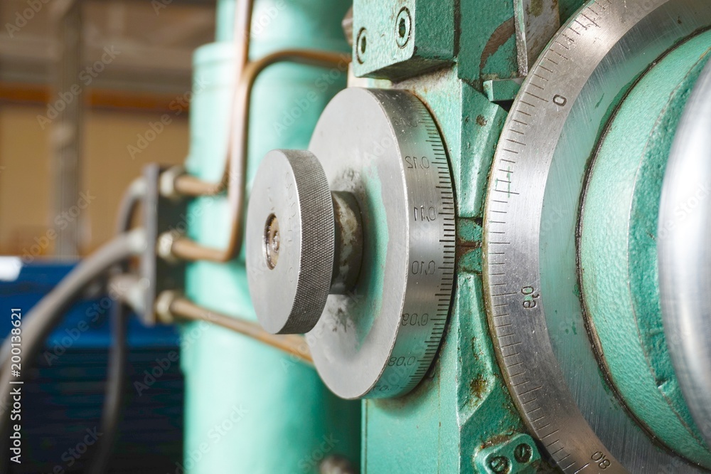 Scale feed on the machine for metal processing. Lathe, grinding and milling machine. Scale feed on the machine for metal processing. Lathe, grinding and milling machine.