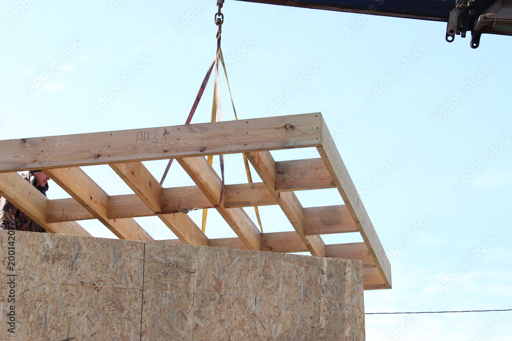 Fototapeta premium Construction of a Frame building or a house