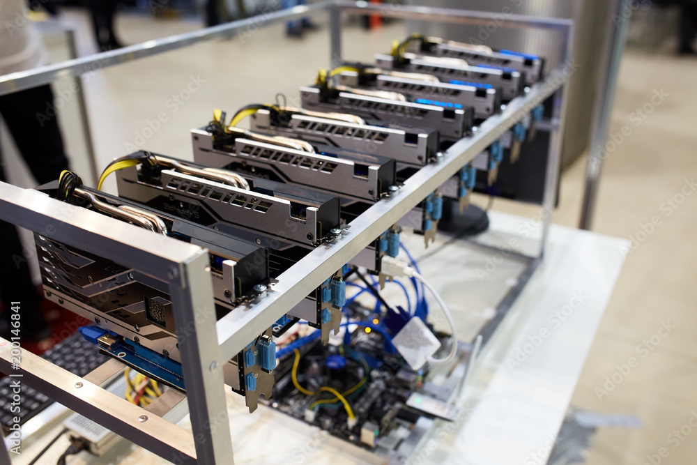 Crypto currency ethereum mining equipment rig - lots of gpu cards on  mainboard. Graphics processing units connected to motherboard with cables.  Server with decryption and encryption computing machines Stock Photo |  Adobe Stock