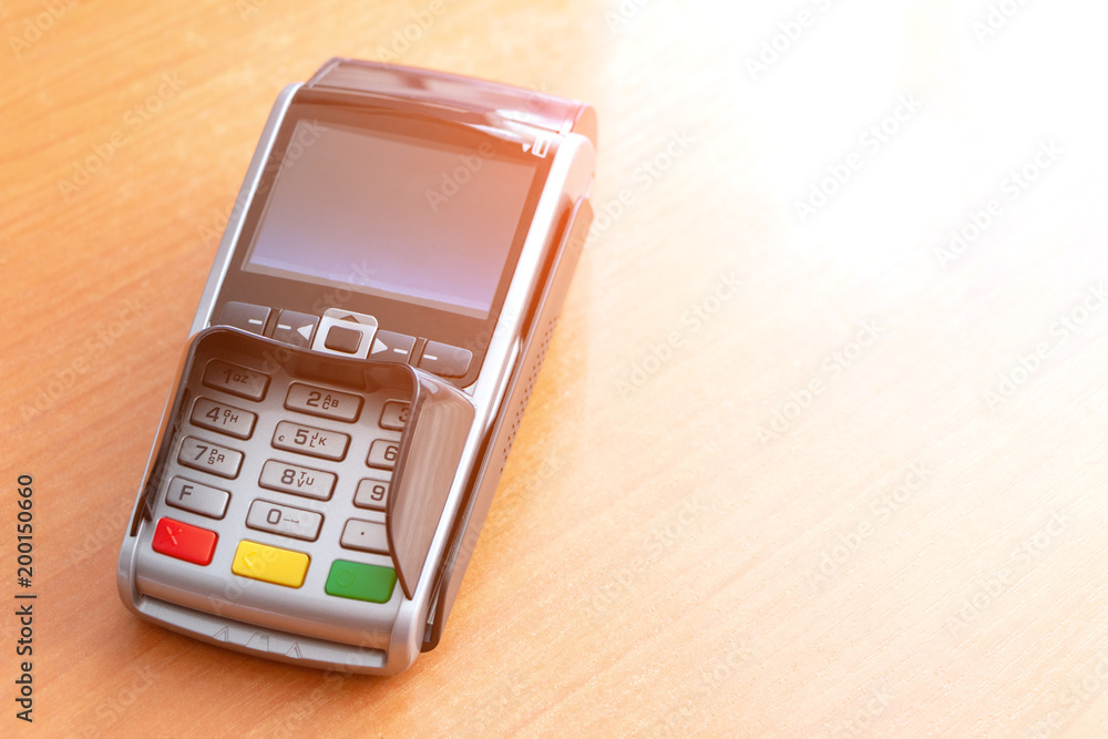 Wireless POS terminal on the table Wireless POS terminal on the table