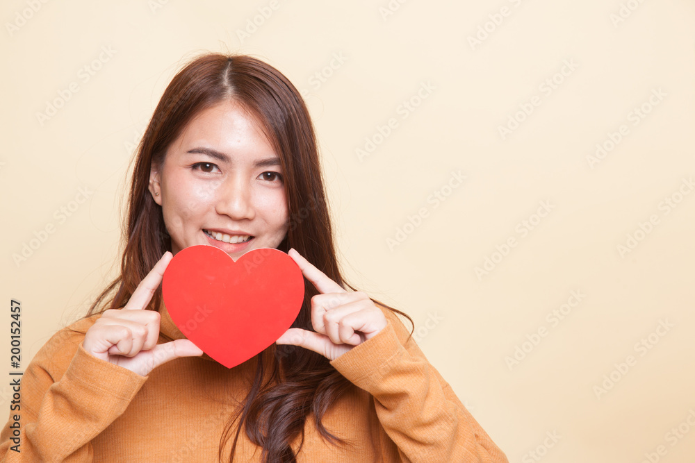 Asian woman with red heart. Asian woman with red heart.