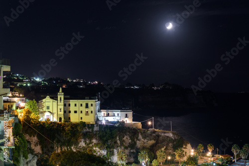 Buildings of Tropea town at night © mkos83