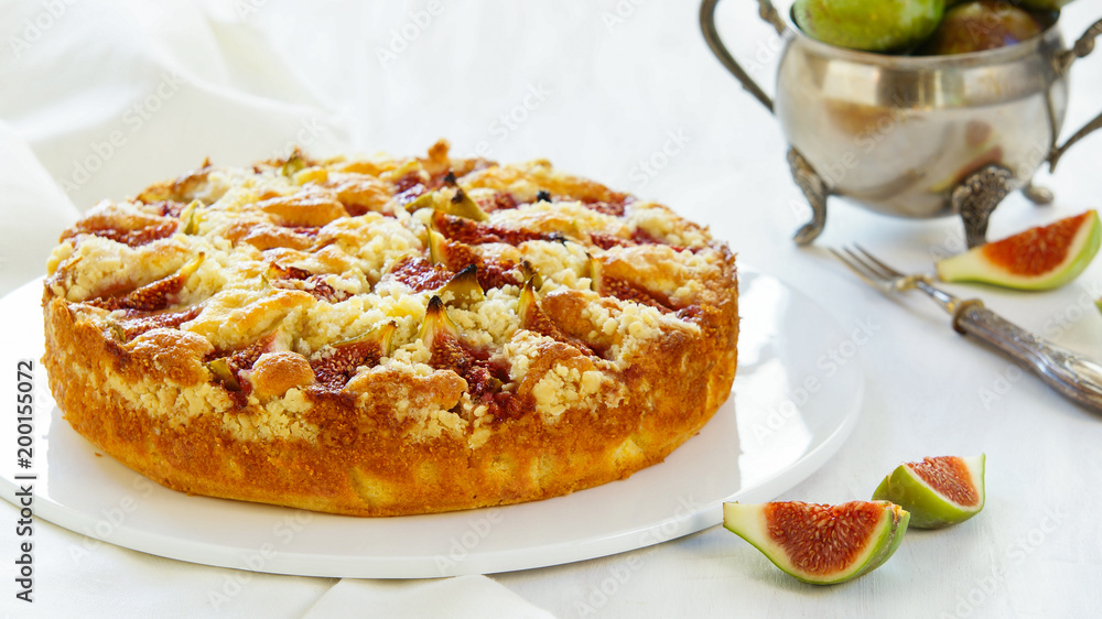 corn flour pie with figs, streusel, gluten free, without wheat, white bakeground silver corn flour pie with figs, streusel, gluten free, without wheat, white bakeground silver