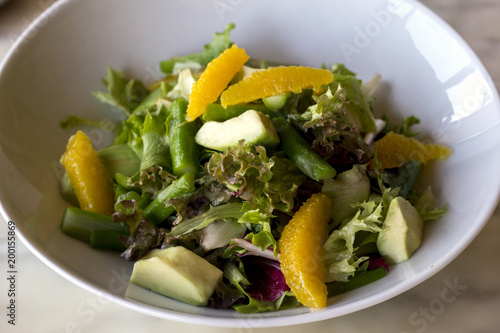 Delicious Salad with apple and orange