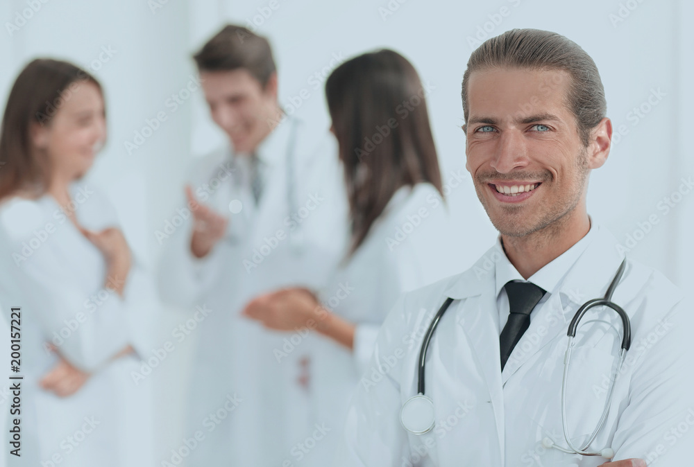 smiling doctor therapist on blurred background. smiling doctor therapist on blurred background.