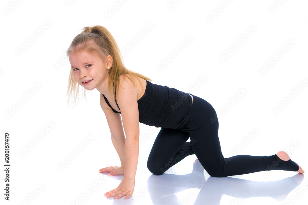 The gymnast prepares to perform the exercise. The gymnast prepares to perform the exercise.