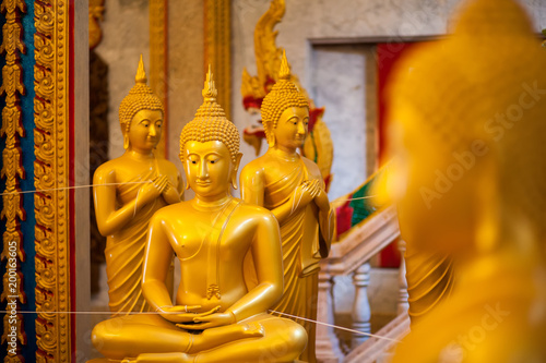 Statue of Golden Buddha in Wat Chalong Temple in Phuket Thailand