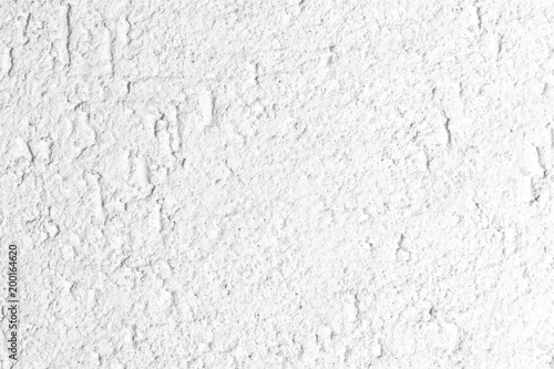 white rough plaster of an exterior wall