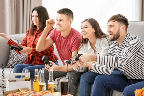 Young people playing video ...