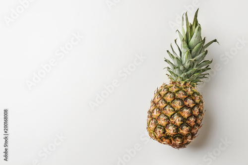 Fresh pineapple on light background