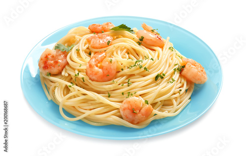 Plate with spaghetti and shrimps on white background