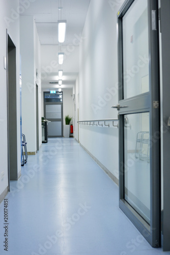 empty office corridor with doors