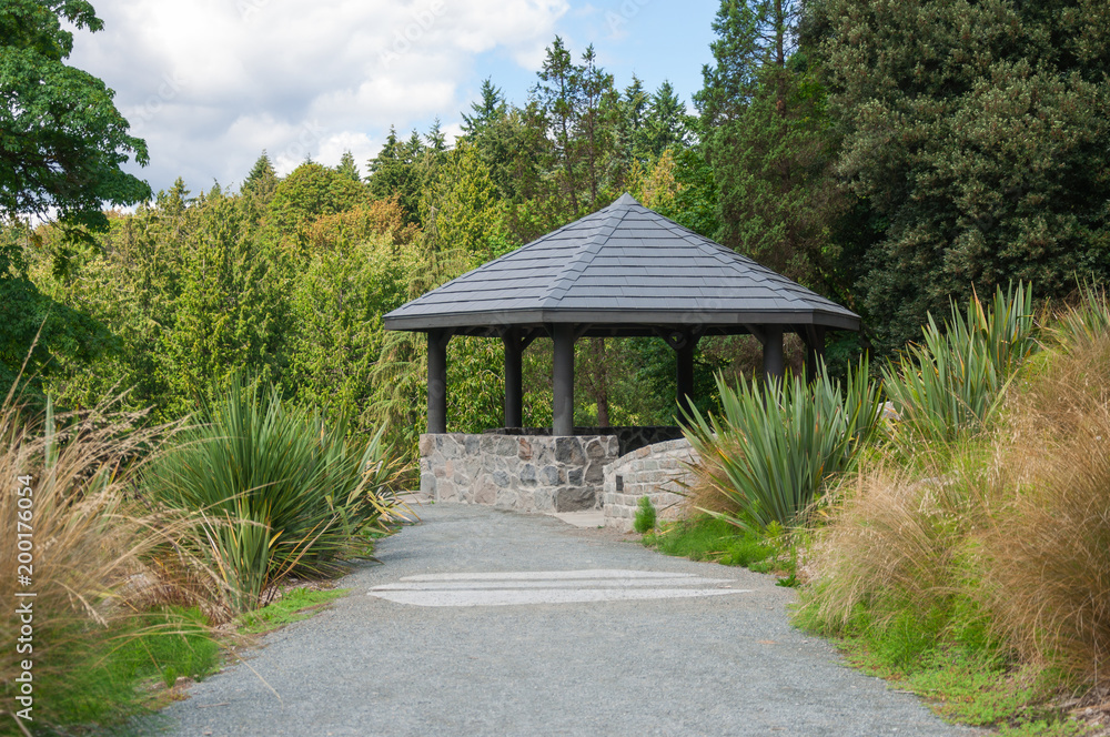 Arbor in shadow of the trees