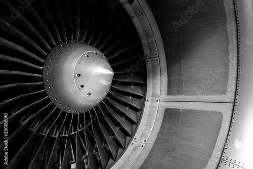 Blades of an aircraft engine close-up. Travel and aerospace concept. Black and white filter photo