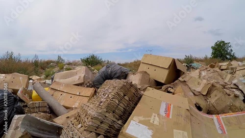 camera moves over elongated cardboard boxes. Slow motion.