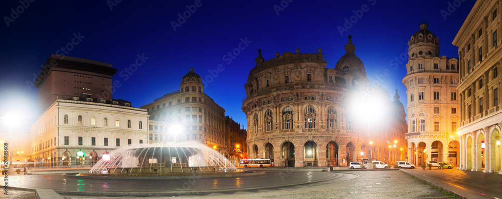 Fototapeta premium Image of night light of The Ferrari Square which is main city square in Genoa in Italy