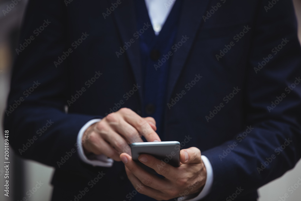 Businessman using mobile phone Businessman using mobile phone