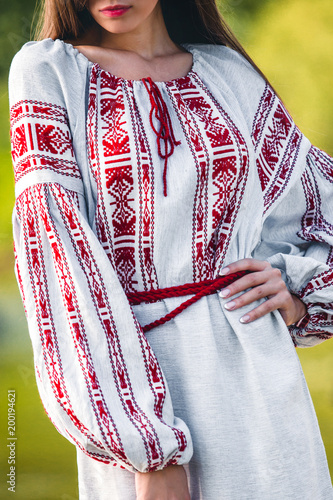 handmade dress with an embroidered pattern with a red thread for women