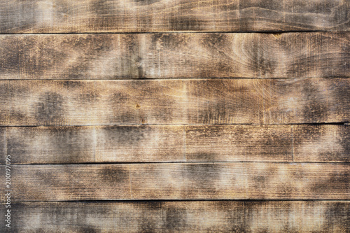 Wooden background of burnt boards