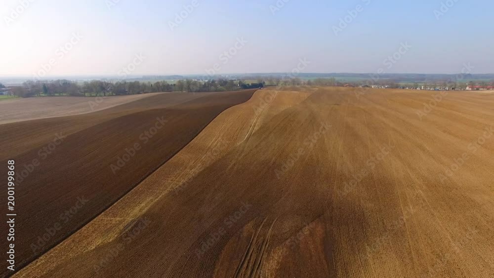 Tractor plows a field in spring -Tractor cultivating a field - Aerial view - 4K UHD - germany
Tractor plows a field in spring -Tractor cultivating a field - Aerial view - 4K UHD - germany