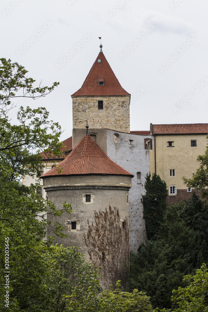 The tower of the ancient Prague Castle in the historic district of Prague. Czech Republic The tower of the ancient Prague Castle in the historic district of Prague. Czech Republic