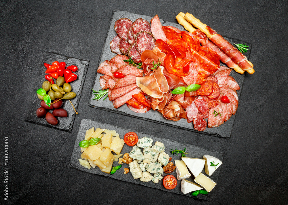 Cold meat cheese plate with salami chorizo sausage and various type of cheese Cold meat cheese plate with salami chorizo sausage and various type of cheese