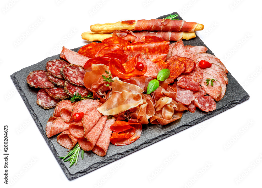 Cold meat plate with salami and chorizo sausage and parma Cold meat plate with salami and chorizo sausage and parma