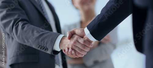 closeup of handshake of business partners photo