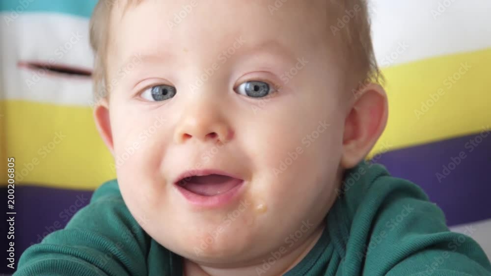 funny baby smiling after eating, slow motion funny baby smiling after eating, slow motion