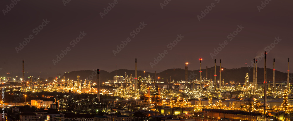 Oil Refinery factory in the night , petrochemical plant