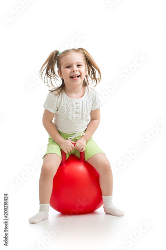 happy child girl jumping on...