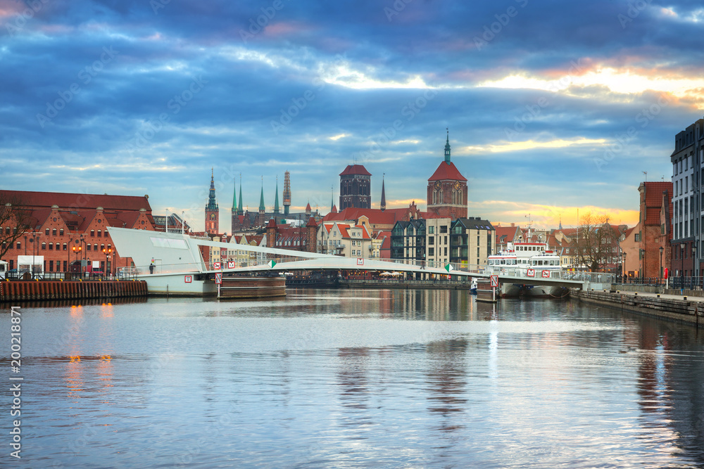 Old town of Gdansk reflected in Motlawa river at sunset, Poland Old town of Gdansk reflected in Motlawa river at sunset, Poland
