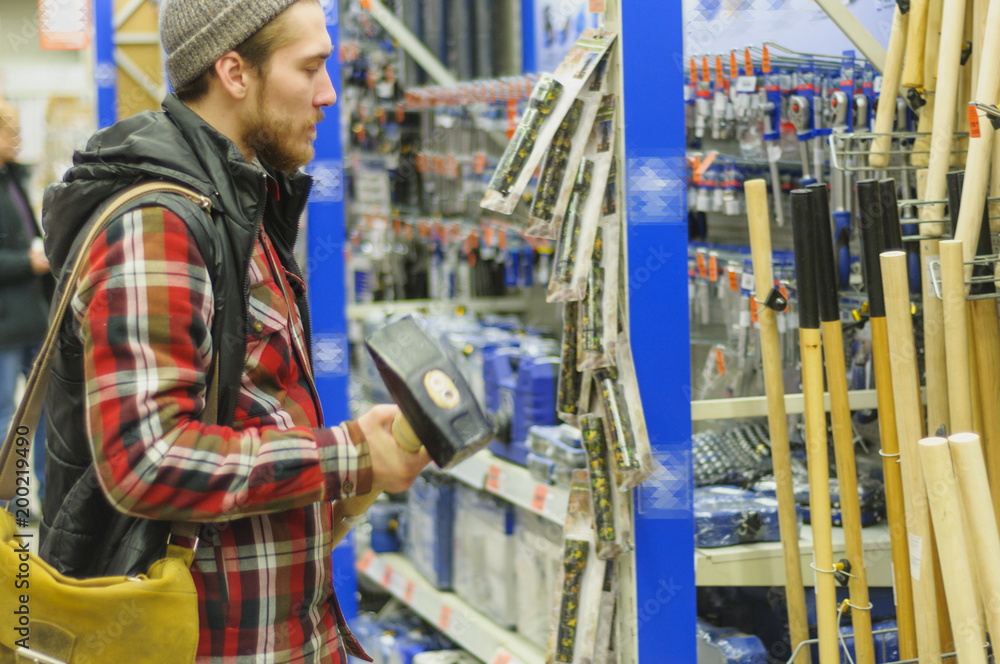 Man in a hardware store Man in a hardware store