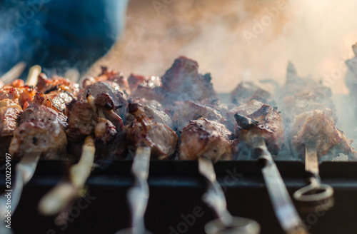 Tasty shish kebab on a charcoal grill. photo
