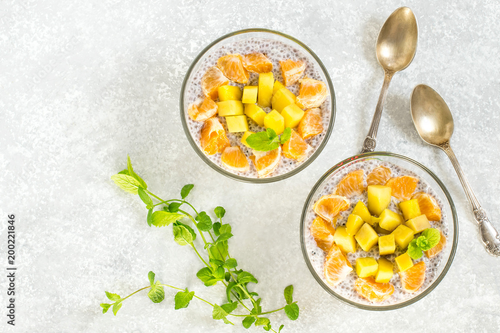 Chia pudding with coconut milk, mango and mandarin Chia pudding with coconut milk, mango and mandarin