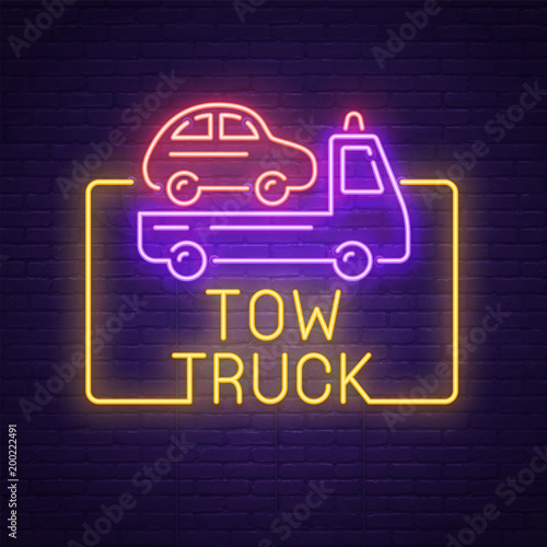 Tow Truck neon sign, bright signboard, light banner. Tow Car logo, emblem and label. Vector illustration