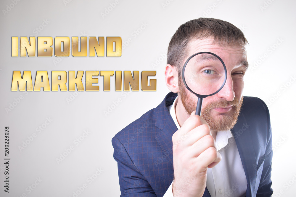 A businessman shows an inscription:INBOUND MARKETING A businessman shows an inscription:INBOUND MARKETING
