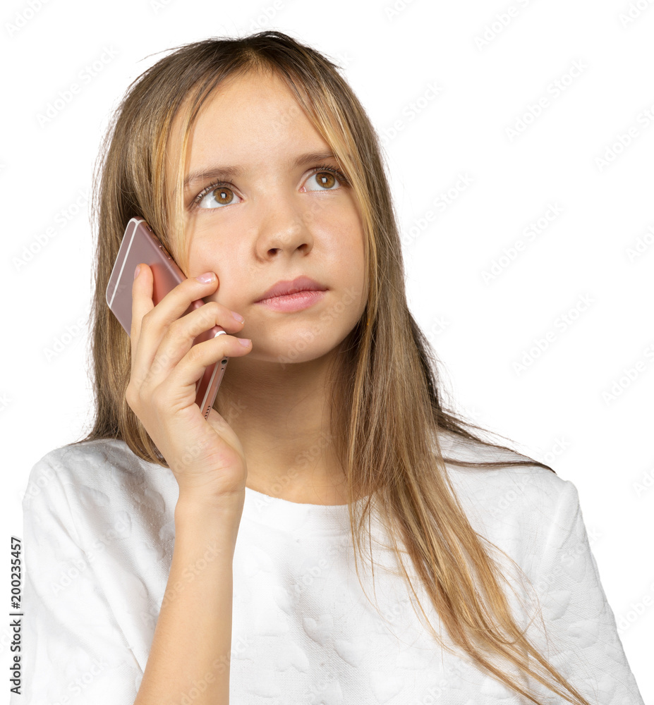 Little girl holding a smart phone against white background Little girl holding a smart phone against white background