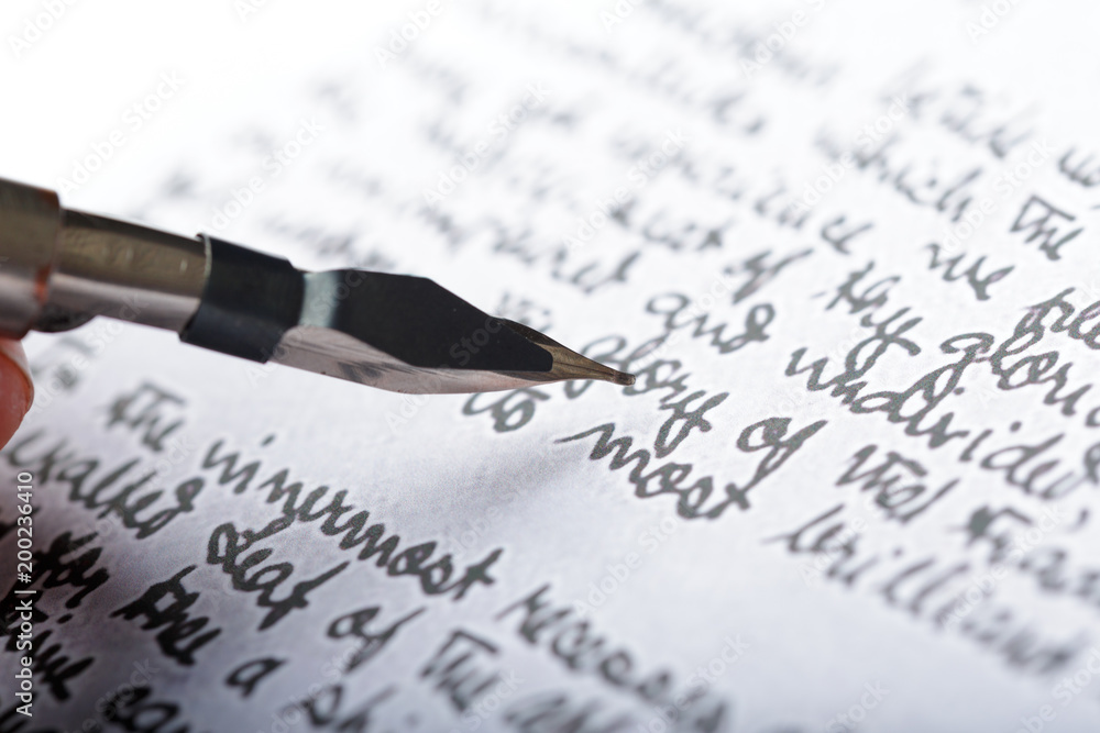 Fountain pen on an antique handwritten letter Fountain pen on an antique handwritten letter
