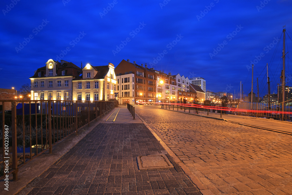 Promenade at Motlawa river in Gdansk at night, Poland